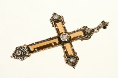 Lot 592 - Diamond and smokey quartz cross pendant in silver mount
