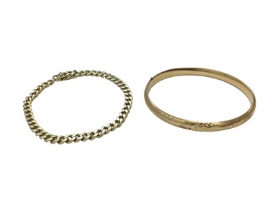 Lot 56 - 14ct gold curb link bracelet and a 14ct gold bangle (2)