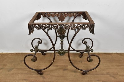 Lot 1370 - 19th century metal table base, with classical pierced frieze and raised on scrolling understructure and castors, 101cm wide x 54cm deep x 82cm high