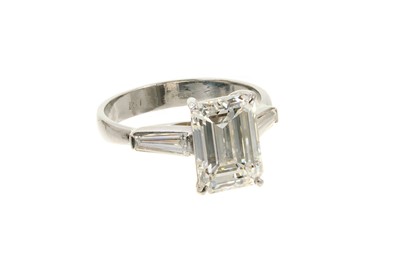 Lot 563 - A fine diamond single stone ring with an emerald cut diamond weighing approximately 3.06cts, estimated I/J colour and estimated VS clarity