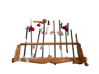 Lot 2413 - Unusual Oriental carved hard stone and jade armoury on stands and musical instruments on stands ( 3 boxes)