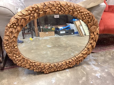 Lot 1477 - Victorian style gilt oval wall mirror, with vine moulded frame. 65 x 84cm