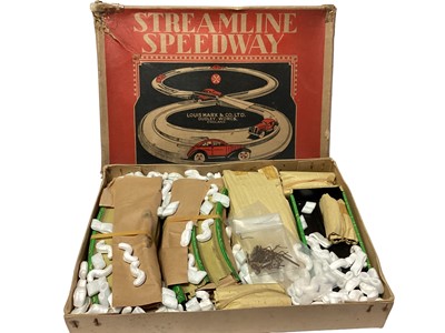 Lot 1831 - Louis Marx & Co Ltd Streamline Speedway tinplate track and three cars, boxed E50, plus The Handicap Race spinning tinplate wheel (2)