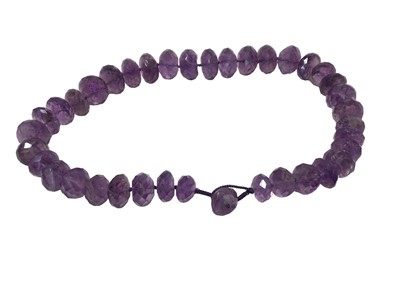 Lot 471 - Amethyst bead necklace with a string of graduated faceted amethyst beads
