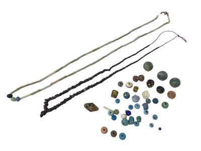 Lot 782 - Egyptian celadon necklace and a similar necklace and Roman glass beads