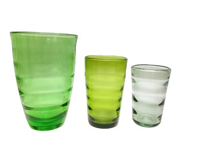 Lot 1123 - Whitefriars Twilight Optic vase, 20cm high, together with two green vases, 23cm and 30cm high