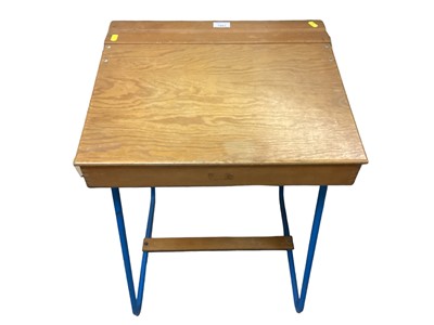 Lot 1861 - A child's desk with wooden lid top and tubular metal frame (1)
