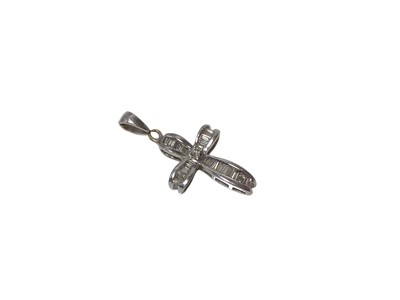 Lot 562 - Diamond cross pendant with baguette cut diamonds estimated to weigh approximately 0.40cts in total, in 9ct white gold setting.