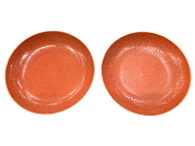 Lot 25 - A pair of Chinese porcelain dishes with unusual red crackled glaze, six character marks in underglaze blue