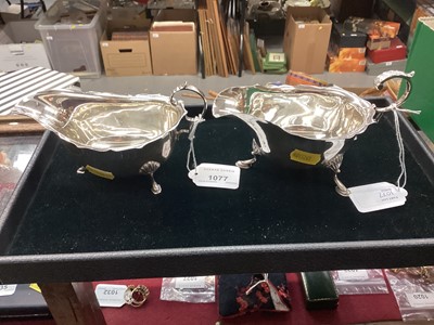 Lot 1077 - Two Georgian-style silver sauceboats