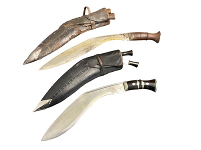 Lot 949 - Two old Gurkha Kukri's in sheaths (2).