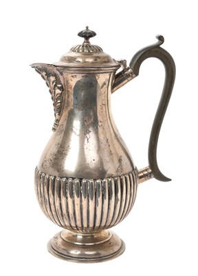 Lot 332 - George III style silver hot water jug