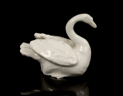 Lot 26 - 18th century white glazed model of a swan, probably Bow