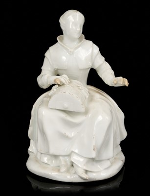 Lot 14 - White glazed porcelain figure of a lacemaker