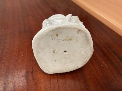 Lot 60 - White glazed porcelain figure of a lacemaker
