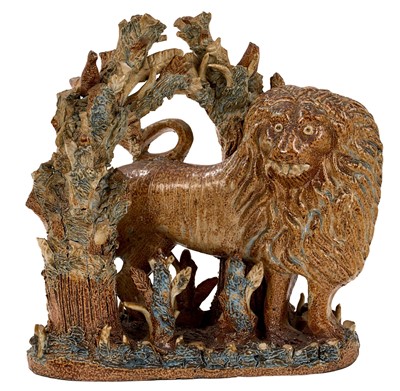 Lot 41 - Rare saltglazed arbour group of a lion