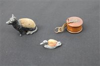 Lot 2113 - 19th century fruitwood tape measure, together...