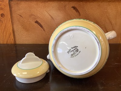 Lot 1200 - Clarice Cliff toast rack together with a teapot (2)