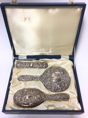 Lot 341 - Contemporary silver four piece dressing table set.