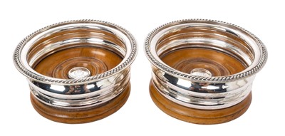 Lot 267 - Pair of good quality Elkington & Co silver plated wine coasters