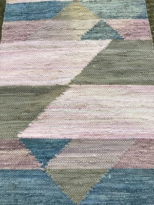 Lot 1446 - Three contemporary rugs with abstract decoration, 149cm x 77cm, 137cm x 66cm and 95cm x 64cm