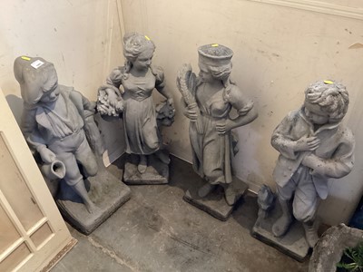 Lot 1493 - Four concrete grey painted garden statues, tallest is 80cm high