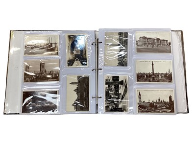 Lot 1446 - Postcards in large album including British real photographic street scenes, hotels, London etc.