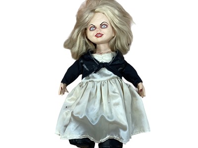 Lot 2027 - Two Chucky dolls and a smaller Chucky doll (3)
