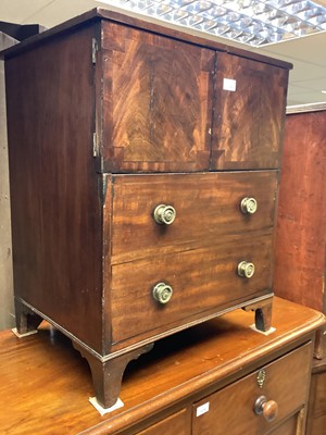 Lot 1294 - George III mahogany commode chest on bracket feet