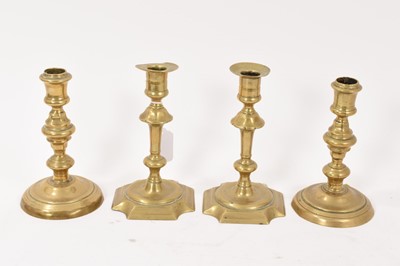 Lot 813 - Pair of mid 18th century brass candlesticks and another pair. (4)