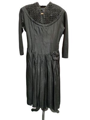 Lot 2102 - 1950s black cocktail dress (label cut), Frank Usher black evening dress with looped underskirt plus a Julian Rose boned bodice strapless evening dress with net and sequin skirt