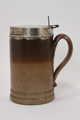 Lot 56 - Large Georgian stoneware salt glaze 2 1/2 pint tankard with silver hinged lid