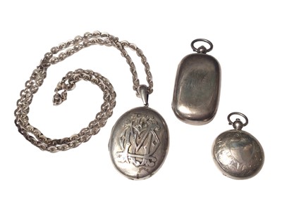 Lot 50 - Victorian white metal oval locket with applied monogram on a later silver chain, together with two antique silver sovereign cases (3)