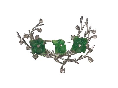 Lot 54 - 1960s Christian Dior paste set floral spray brooch with three green lucite flowers, 6.5cm