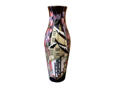 Lot 1139 - Moorcroft pottery vase decorated in the Flowers at Christmas pattern, signed, dated 2009, 25.5cm high