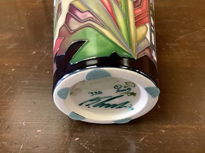 Lot 1139 - Moorcroft pottery vase decorated in the Flowers at Christmas pattern, signed, dated 2009, 25.5cm high