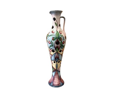 Lot 1141 - Moorcroft M.C.C vase with floral decoration on multi coloured ground, numbered 3 of 3, dated 2010, 32cm high