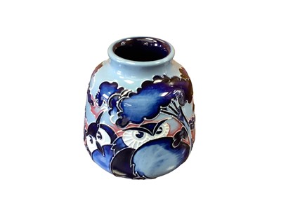Lot 1142 - Moorcroft pottery vase decorated with Owls on blue ground, dated 2010, 8cm high