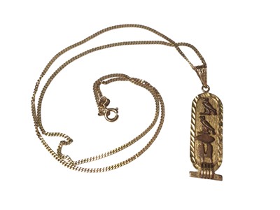 Lot 74 - Egyptian yellow metal pendant on 18ct gold chain