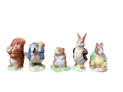 Lot 1165 - Eight Beswick Beatrix Potter figures including Tommy Brock and Squirrel Nutkin, together with a Royal Albert figure - Old Mr Brown (9)