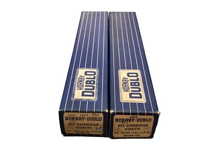 Lot 1934 - Trix Railway TTR, E. R. Passenger F24 set boxed, plus two Hornby Dublo coaches also boxed.