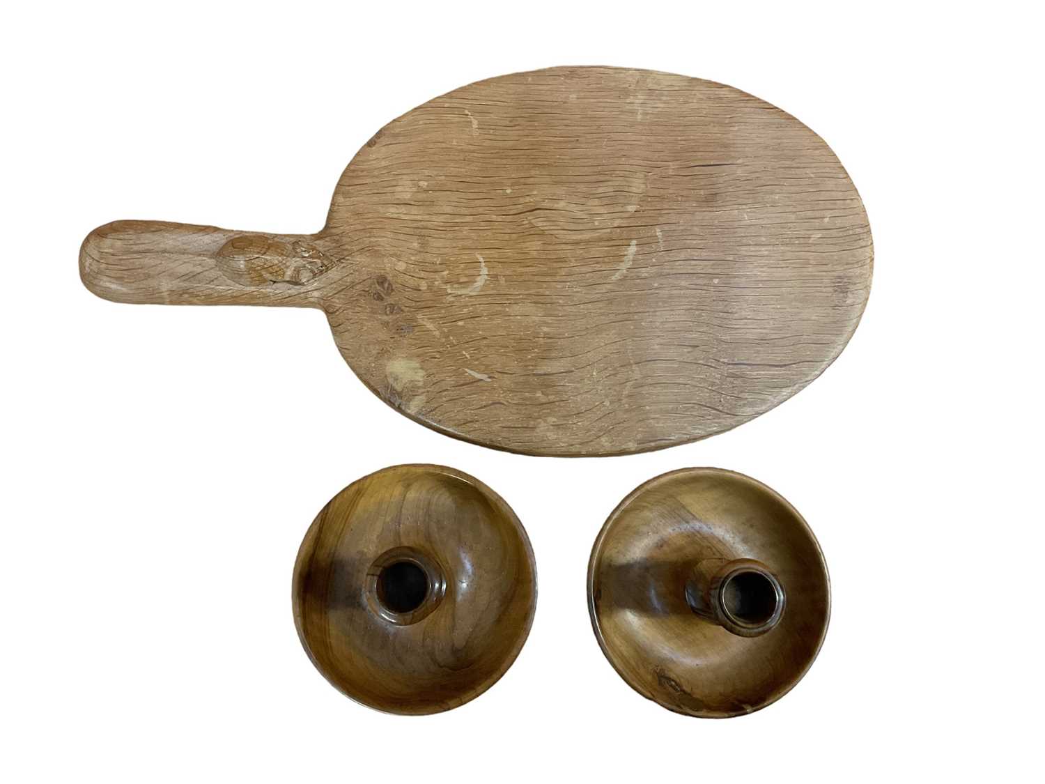 Lot 2430 - Mouseman chopping board and a pair of olive wood candlesticks