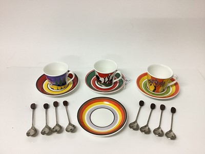 Lot 1203 - Seven Wedgwood Clarice Cliff limited edition Cafe Noir cups and saucers - Red Autumn, Tulip, Monsoon, Garden Blue, Fantasque Mountain, Windbells and Blue Lucerne, together with another saucer - Cor...