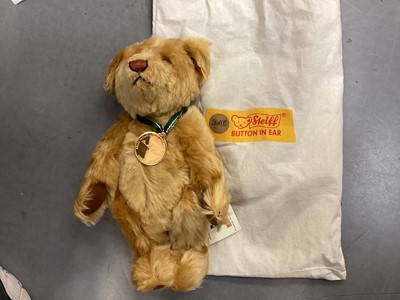 Lot 1941 - Two Steiff teddies The 2001 Bear no. 654756 with swing label, certificate and soft Steiff bag and The Millennium Bear no. 654701with cerificate and soft Steiff bag