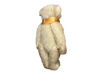 Lot 1941 - Two Steiff teddies The 2001 Bear no. 654756 with swing label, certificate and soft Steiff bag and The Millennium Bear no. 654701with cerificate and soft Steiff bag
