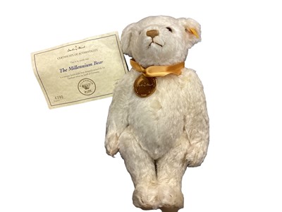 Lot 1941 - Two Steiff teddies The 2001 Bear no. 654756 with swing label, certificate and soft Steiff bag and The Millennium Bear no. 654701with cerificate and soft Steiff bag