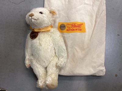 Lot 1941 - Two Steiff teddies The 2001 Bear no. 654756 with swing label, certificate and soft Steiff bag and The Millennium Bear no. 654701with cerificate and soft Steiff bag