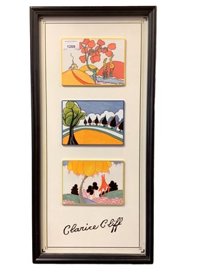 Lot 1209 - Bradex Clarice Cliff limited edition porcelain plaques mounted in a frame, 58cm x 28cm
