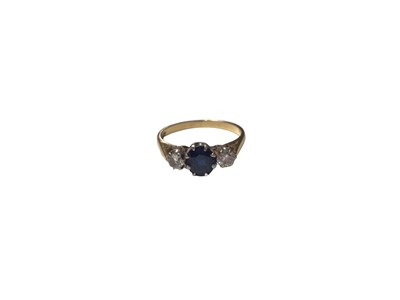 Lot 105 - 18ct gold sapphire and diamond three stone ring