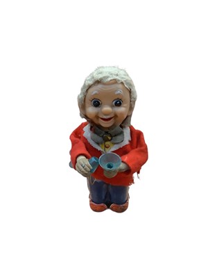 Lot 2037 - 1950s tinplate clockwork bar tender figure